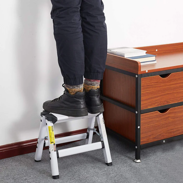 person standing on stool